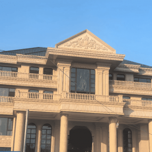 湖南黄金麻别墅外墙干挂石材效果示例