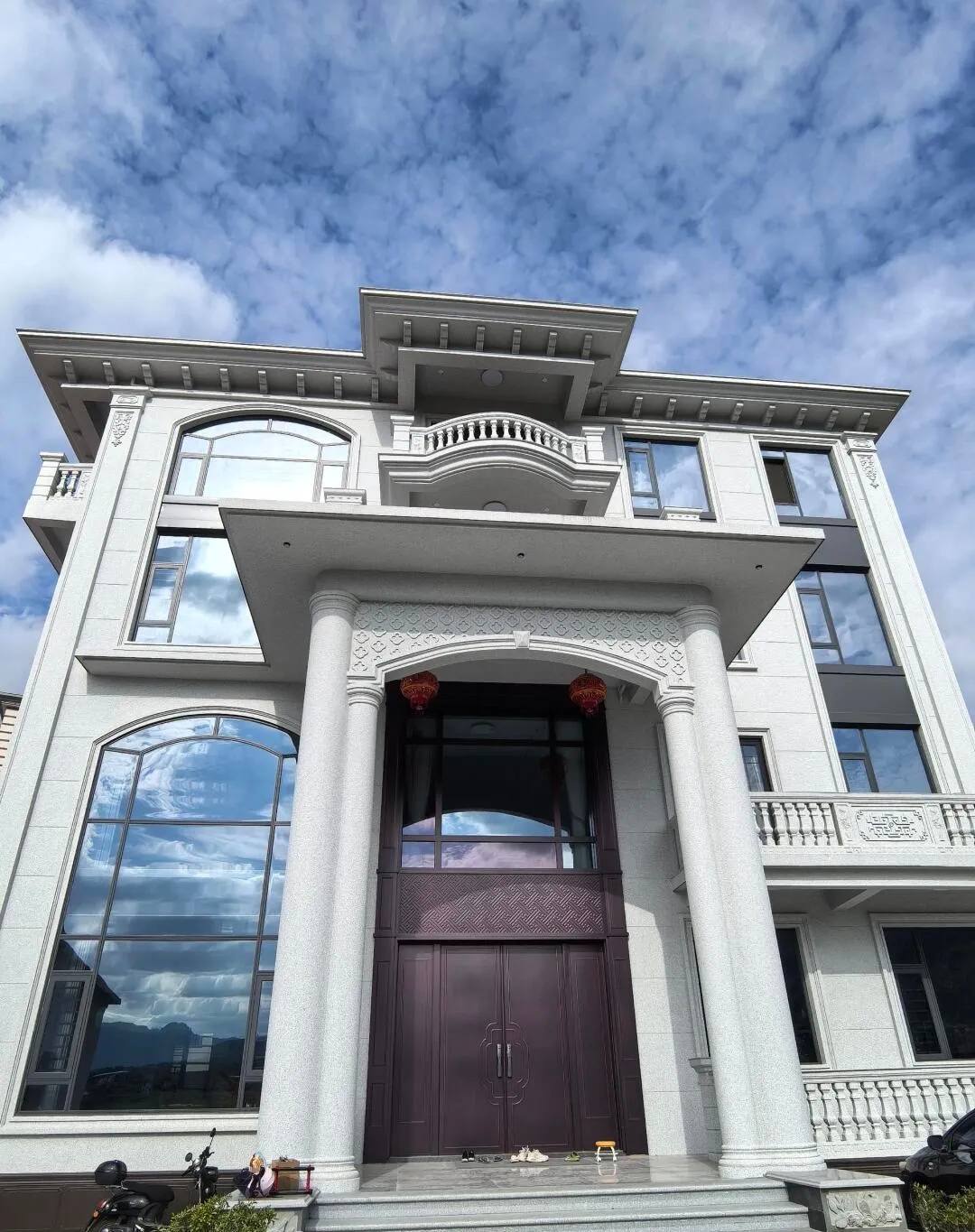 湖南白麻别墅外墙干挂石材效果示例