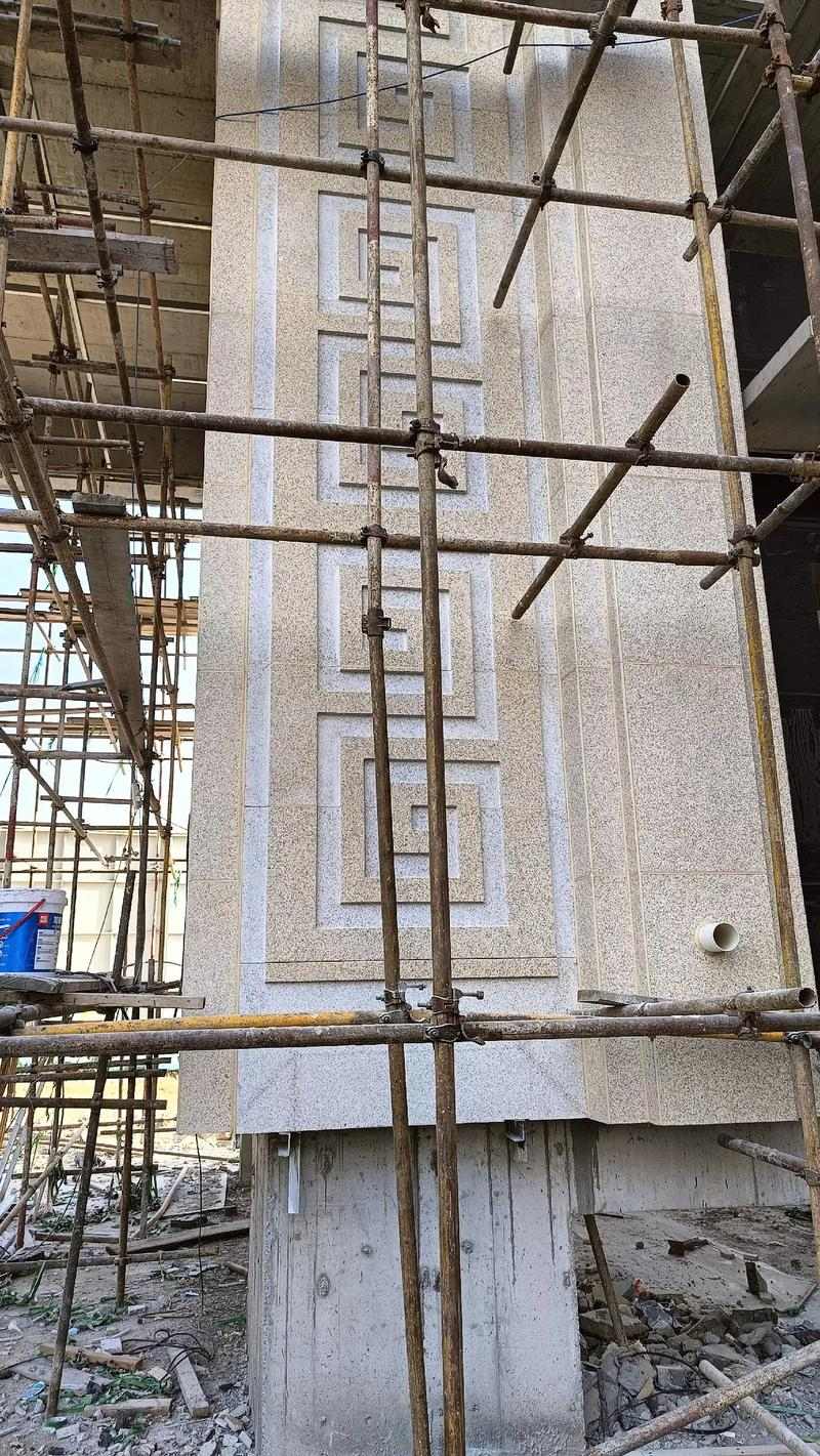 湖南 黄金麻花岗岩别墅外墙干挂回纹造型效果